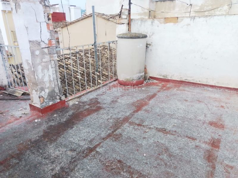 Foto f7d2c044-c492-4c8d-8f15-ebc7c1b51137. Casa adosada en calle virgen soledad 10 en Olleria (l´)