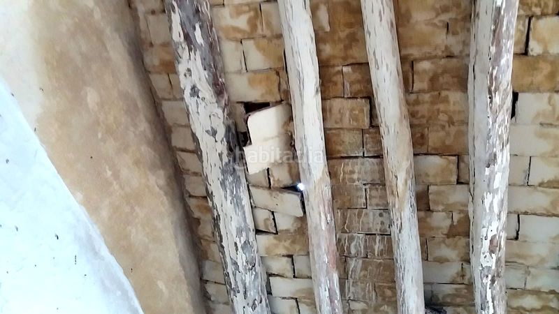 Foto ef44da88-c187-415a-a75f-ccc86049c618. Casa adosada en calle barrera 23 en Zuheros