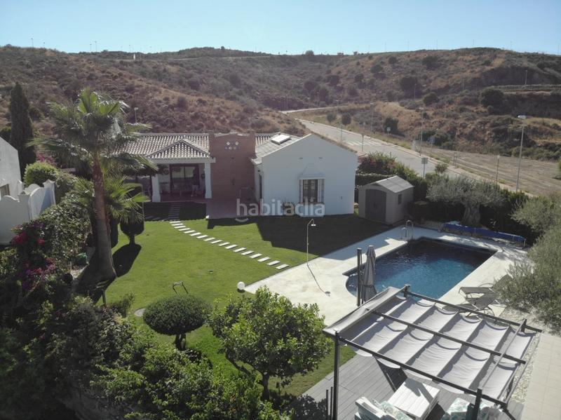 Foto 1e3a1916-7a1f-4736-a27b-d55496b9339c. Chalet en urbanizacion jardines del aguila villa jardines del aguila vistas al mar y primera linea de golf en Mijas