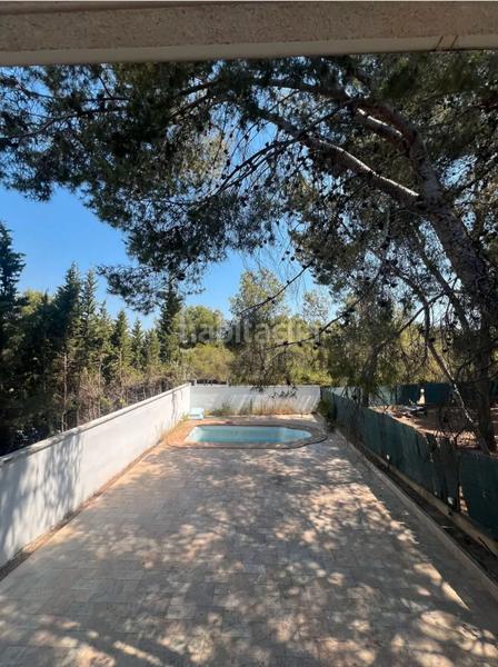 Foto c9a026d3-1a77-47b2-92cc-8ae7c3282478. Lloguer xalet amb xemeneia aparcament piscina a El Vedat - Santa Apolonia Torrent