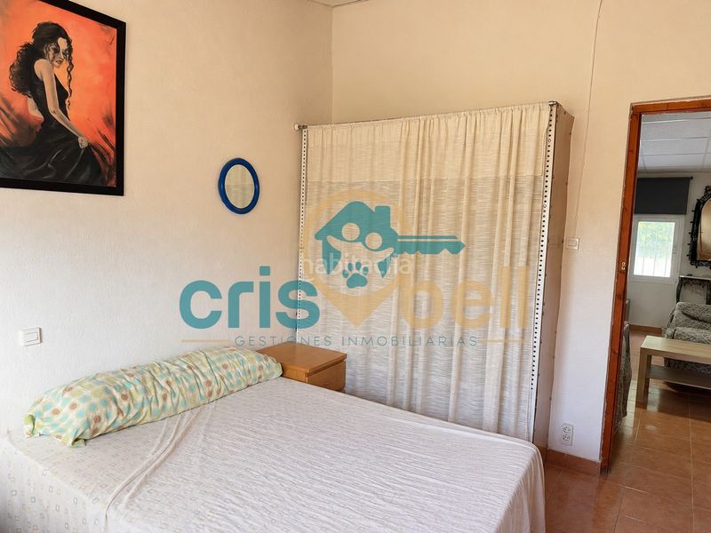 Foto 77a734b0-6cef-4919-9e82-4e8eb0cd57d9. Casa amb xemeneia aparcament a Marchena Lorca