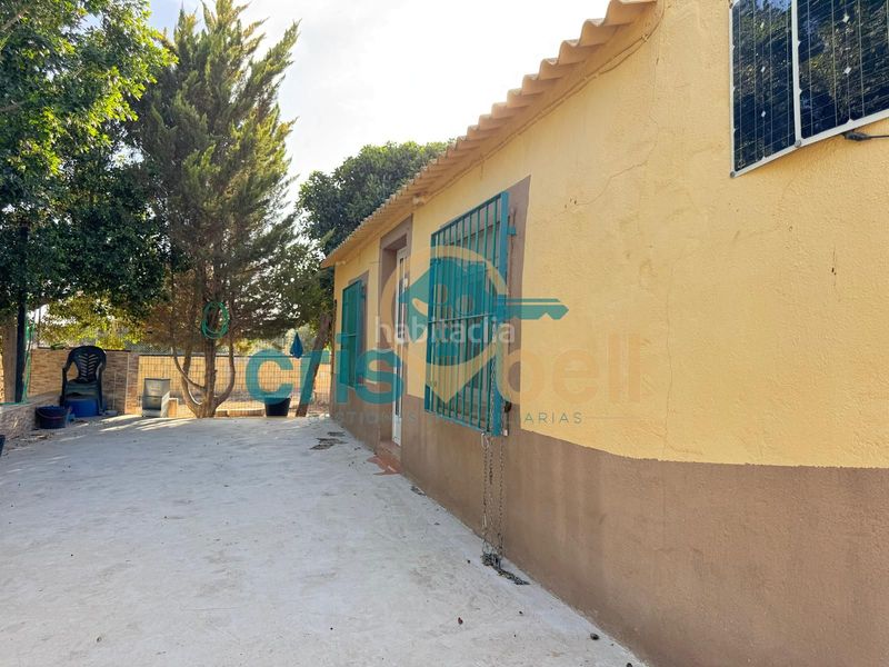 Foto 8218b1b0-0c2c-4efa-abd6-adbbeb173dbc. Casa amb xemeneia aparcament a Marchena Lorca