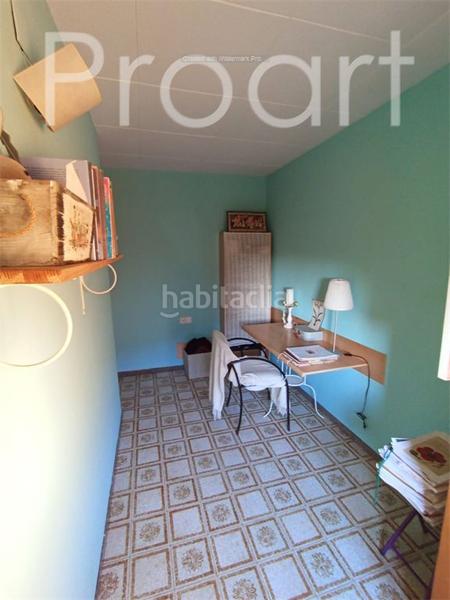 Foto 899b9cfe-8572-4aba-b780-e7f7c7ee2d5d. Casa adosada  de dos plantas en parcela totalmente plana con jardin y garaje en Riells i Viabrea