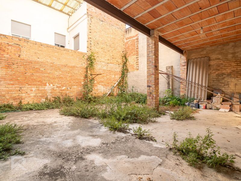 Foto 9c2ed309-f1f3-471f-b112-4c6dba071eef. Casa amb aparcament a Bellreguard