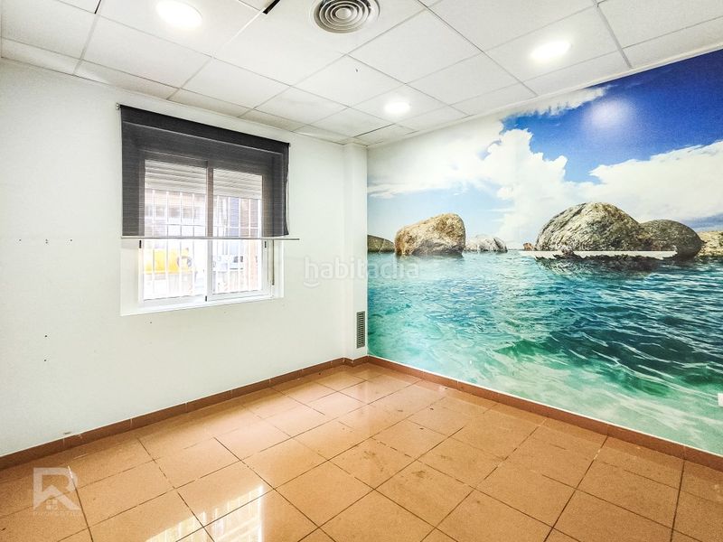 Foto 2ab44faf-abb1-4d97-8394-d1375f0a0579. Planta baja local comercial con vivienda y almacén en Gandia