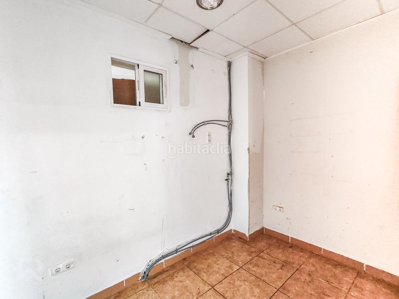Foto 4fb49efc-34d7-422b-b6cd-6cf0d2379b60. Planta baja local comercial con vivienda y almacén en Gandia