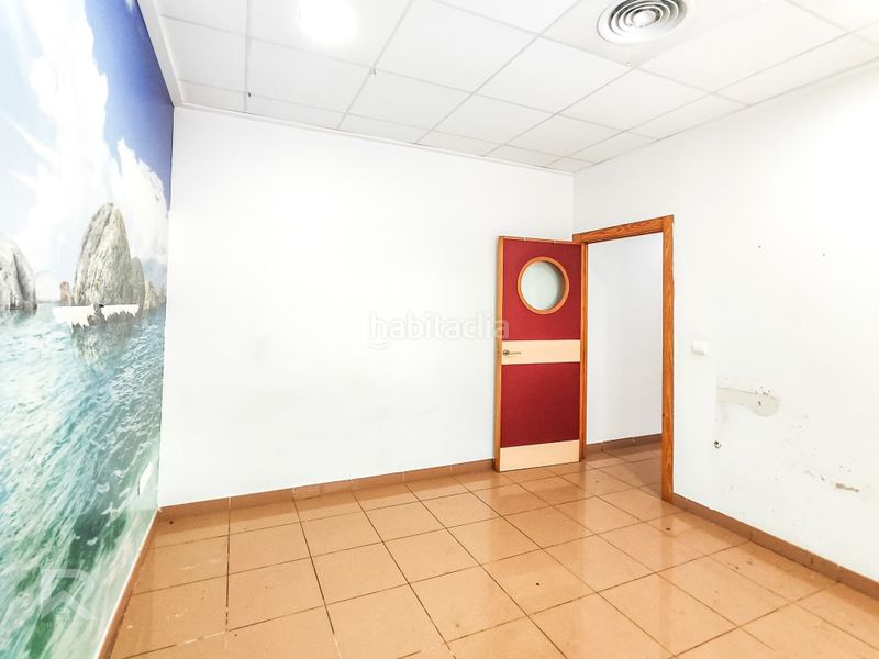 Foto dd885574-c516-4c2b-b0fd-1bb50e8d6e03. Planta baja local comercial con vivienda y almacén en Gandia