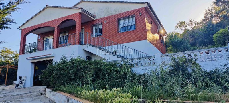 Foto 6f7f1085-e0cc-4467-a270-689dcaa4a75b. Xalet amb xemeneia calefacció aparcament piscina a Vallirana