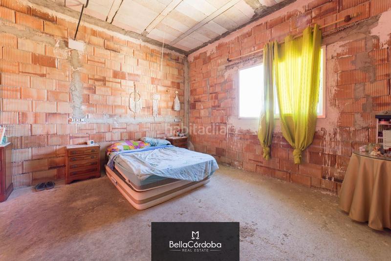 Foto bfa7b2c2-85a2-44a2-a381-709944c53058. Chalet casa en construccion en urb. maravillas del aeropuerto, no hipotecable en Córdoba