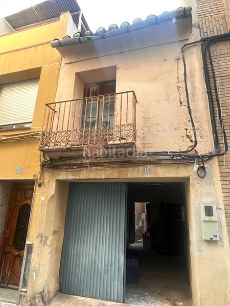 Foto c724c40d-ebd0-46e3-943c-c1bb9ed522aa. Casa adossada a Centro Burriana