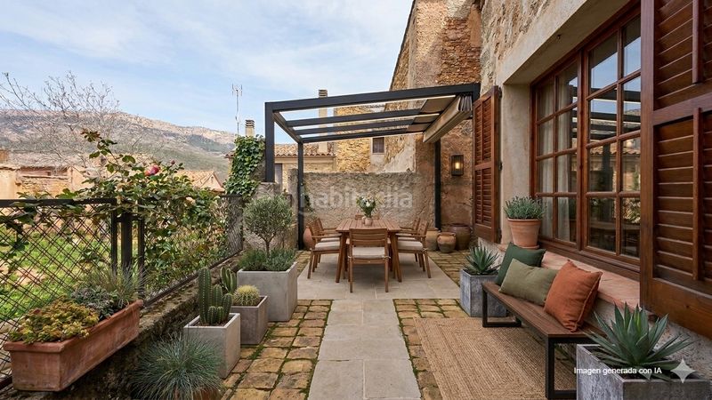 Foto 059dcda7-09a2-46b0-89f3-fda3159a2d52. Casa adossada a Àger