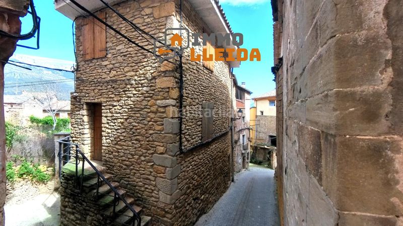 Foto ad0bb2f0-0c6a-4346-9bfd-66a9c9270fd9. Casa adossada a Àger