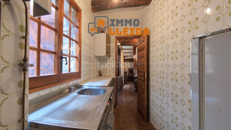 Foto dcadc818-58a6-495e-886b-7f4559ce0ca3. Casa adossada a Àger