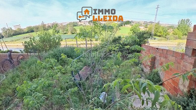 Foto 96a5a3cc-f017-4ea9-b5f7-05188a058e80. Casa adossada a alguer 11 a Balaguer