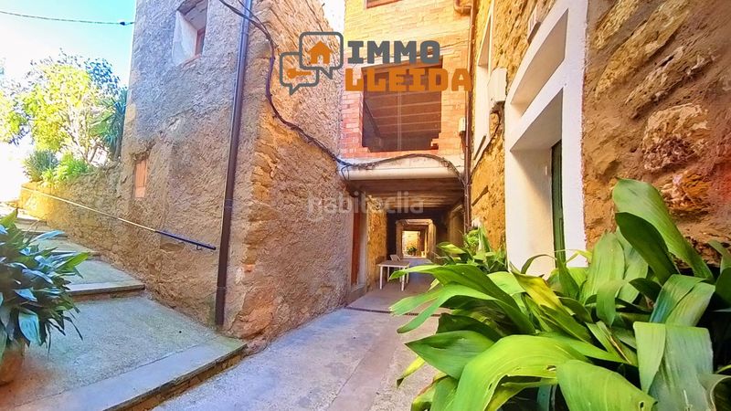 Foto fdecccb2-1204-4f72-b465-a25ad4978240. Casa adossada a calle major a Vilanova de Meià