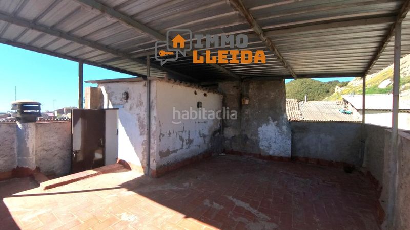 Foto 0d3874c4-1997-4fb5-ab18-dbc311ffa192. Casa adosada en calle santa maria encanto y amplitud en el corazón en Castelló de Farfanya