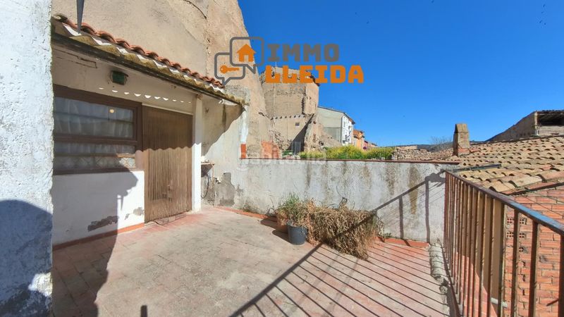 Foto 0d62a491-a637-45a1-9812-2a6f62d31a95. Casa adosada en calle santa maria encanto y amplitud en el corazón en Castelló de Farfanya