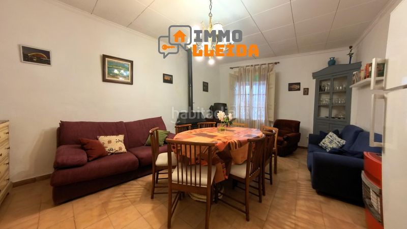 Foto 175df311-dccd-4ff7-908e-c36ce6a8a476. Casa adosada en calle santa maria encanto y amplitud en el corazón en Castelló de Farfanya