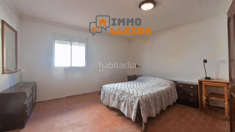 Foto 20fa8282-a897-439a-a8a4-8ef8ac7e7b78. Casa adosada en calle santa maria encanto y amplitud en el corazón en Castelló de Farfanya
