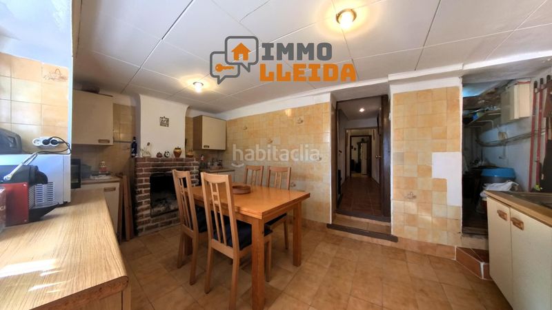 Foto 4d41718d-05c2-40f0-9e7a-4bc594624e20. Casa adosada en calle santa maria encanto y amplitud en el corazón en Castelló de Farfanya