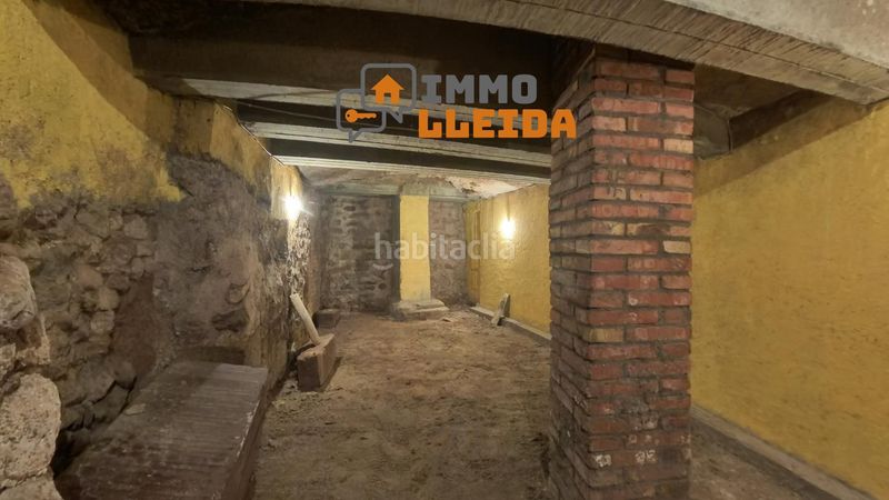 Foto 53a0c868-afcc-4f68-b0ee-6c13880f49d3. Casa adosada en calle santa maria encanto y amplitud en el corazón en Castelló de Farfanya