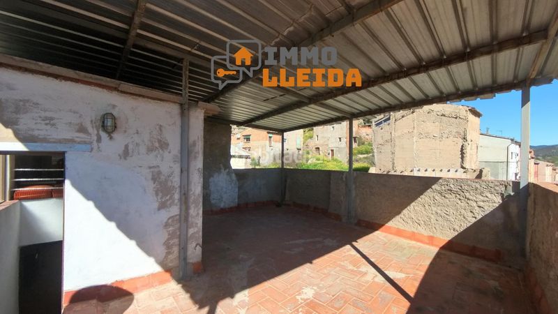 Foto 602b0501-d135-4a5c-89d7-ed738ce9d9c1. Casa adosada en calle santa maria encanto y amplitud en el corazón en Castelló de Farfanya