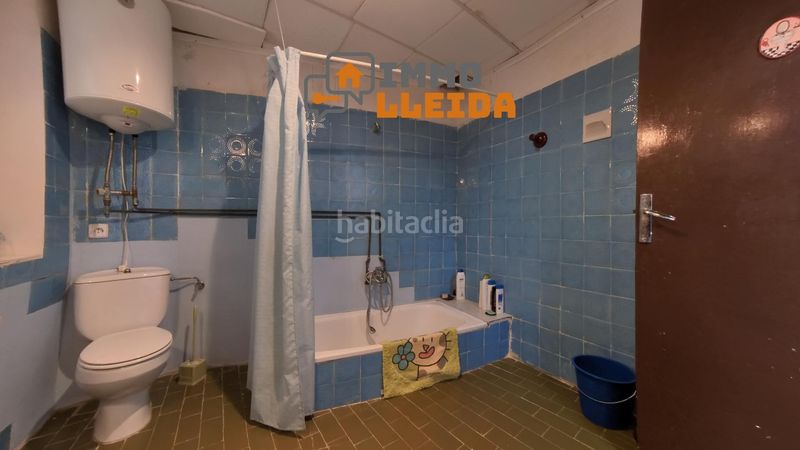 Foto 636ed9f3-7a64-46c8-ad2d-a07083bf4455. Casa adosada en calle santa maria encanto y amplitud en el corazón en Castelló de Farfanya