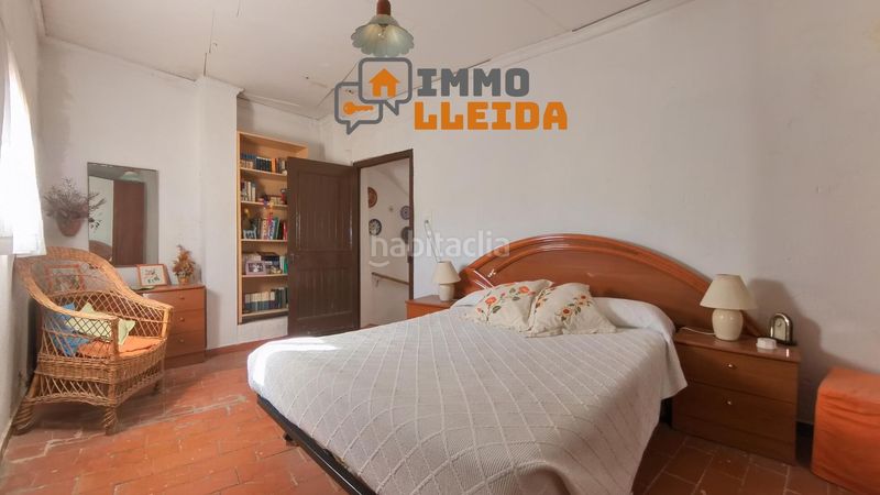 Foto 80fe1ae9-1ee4-4d4f-93d8-207fcc1dc610. Casa adosada en calle santa maria encanto y amplitud en el corazón en Castelló de Farfanya