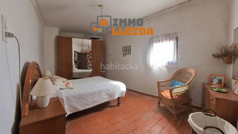 Foto 866738c6-34e2-4f12-9196-11bd6f4f7f4f. Casa adosada en calle santa maria encanto y amplitud en el corazón en Castelló de Farfanya