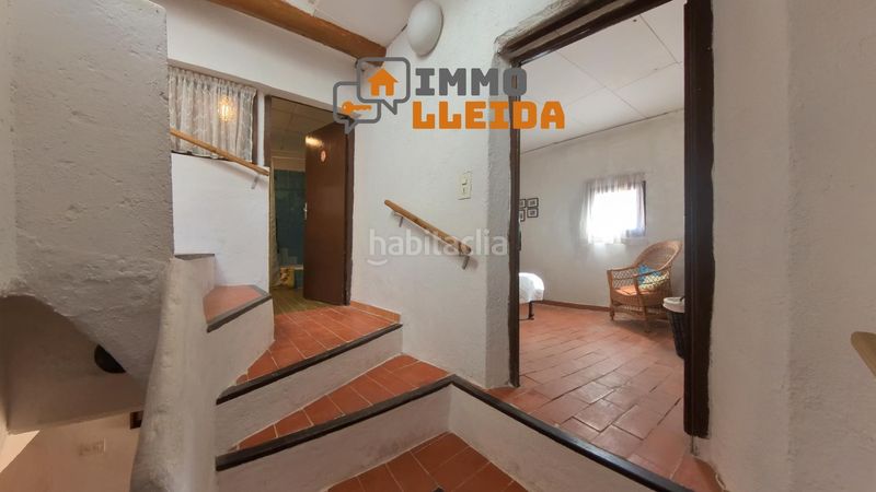 Foto add4b7ef-3a13-4246-94df-d61d8b59e888. Casa adosada en calle santa maria encanto y amplitud en el corazón en Castelló de Farfanya