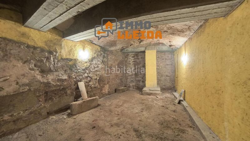 Foto b43c0ec0-4d53-4aac-ba75-91a61f663c48. Casa adosada en calle santa maria encanto y amplitud en el corazón en Castelló de Farfanya