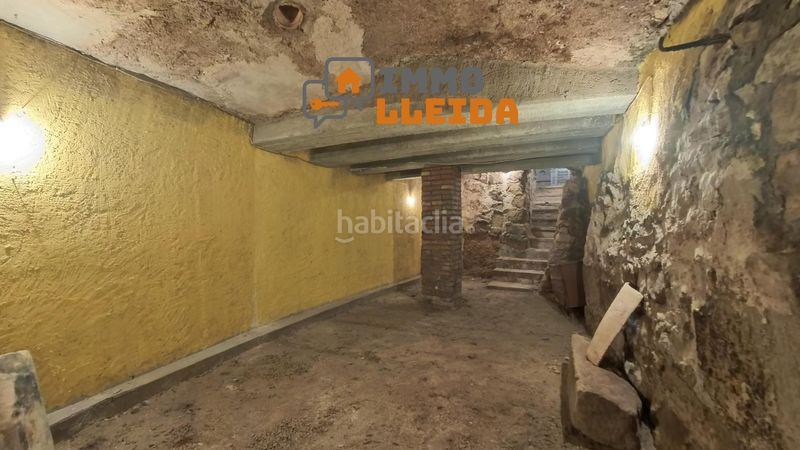Foto c1c78f35-2479-489a-b927-72eb16f6aa04. Casa adosada en calle santa maria encanto y amplitud en el corazón en Castelló de Farfanya