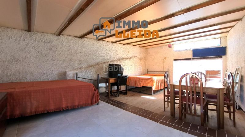 Foto e0208a2f-70de-4332-96fb-3c4874ae3184. Casa adosada en calle santa maria encanto y amplitud en el corazón en Castelló de Farfanya