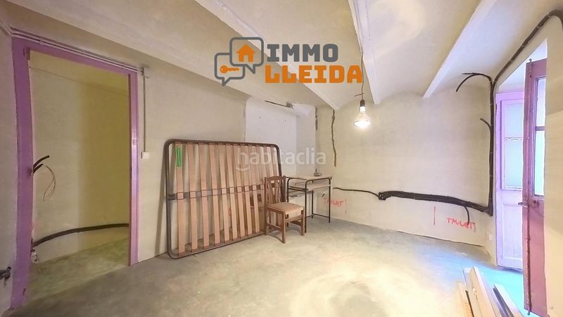 Foto 13e5bcd6-1757-4dd3-a06f-f4f652fa6631. Casa adossada a calle sant vicenç 2 a Àger
