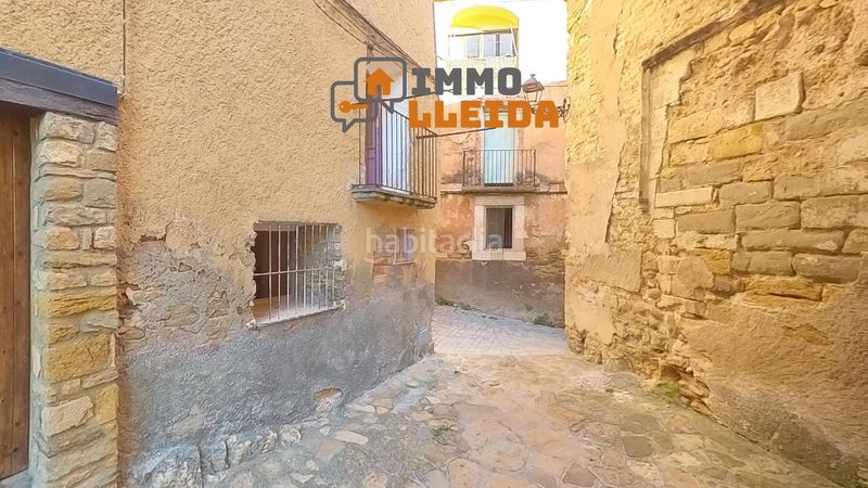 Foto 65ea1a3f-090f-4348-8506-55c964fb604a. Casa adossada a calle sant vicenç 2 a Àger