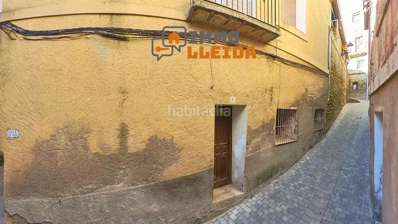 Foto bb502868-b69b-45e9-8978-55d808ed8058. Casa adossada a calle sant vicenç 2 a Àger