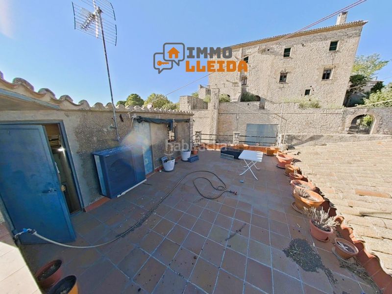Foto 31aff6c8-edfb-4cf0-9c6e-872438cc2c00. Casa adossada a calle castell 3 a Estaràs