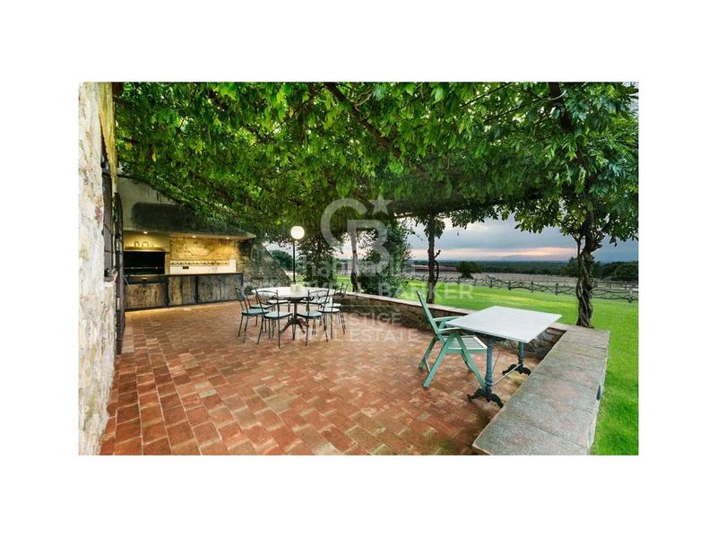 Foto cda4eddc-bf6d-4098-bad9-d9f279120fb8. Casa preciosa masia centenaria en cassá de la selva en Cassà de la Selva