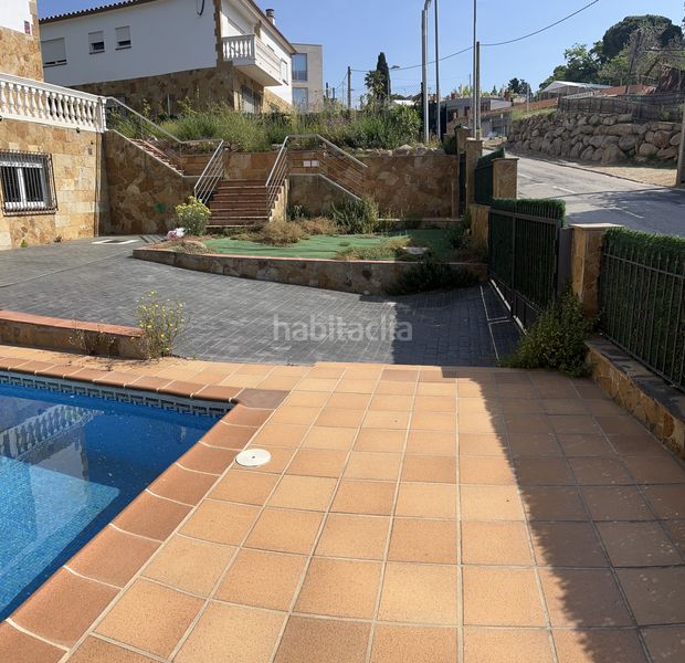 Foto fecf179d-123d-41b4-adfe-c74782289066. Casa amb calefacció aparcament piscina a Serra Brava Lloret de Mar