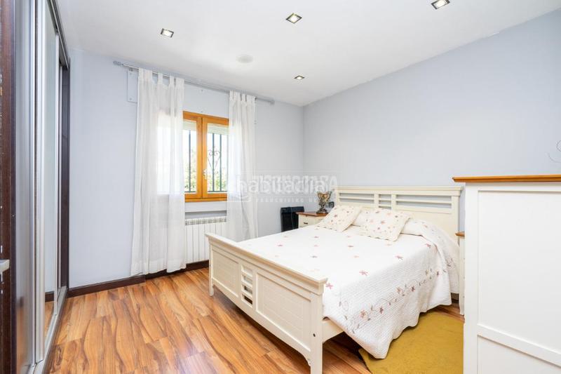 Foto 6808ae5c-8bb7-48ef-9731-484e421e747c. Casa aparellada amb calefacció aparcament piscina a Manzanares el Real