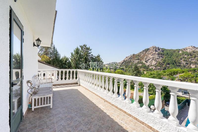 Foto 81476b02-3fb5-4ad0-888e-ef226c292991. Casa aparellada amb calefacció aparcament piscina a Manzanares el Real