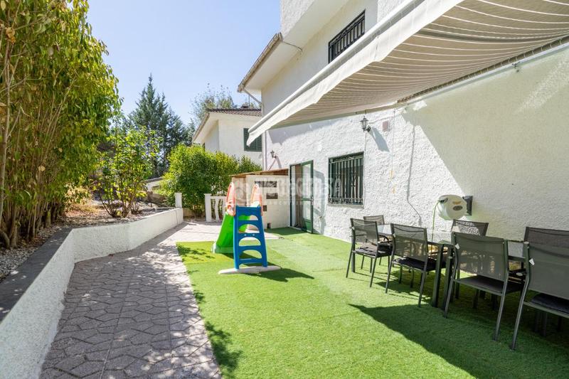 Foto c5dad6ff-66ad-4c0b-9715-afb0887cda4e. Casa aparellada amb calefacció aparcament piscina a Manzanares el Real