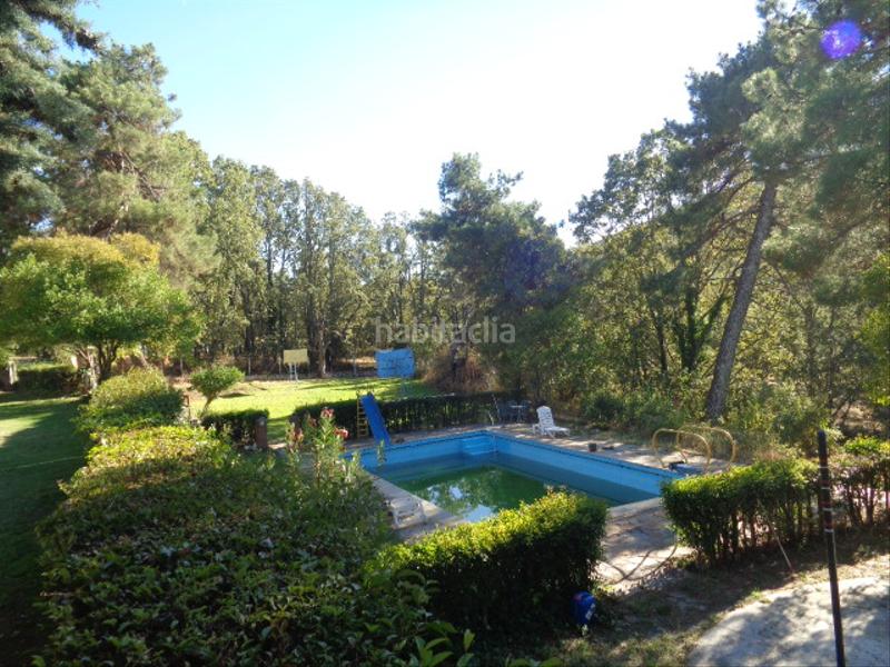 Foto 2e311266-0366-4456-8a8a-31cfd988e2fb. Chalet with fireplace parking pool in Navamorcuende