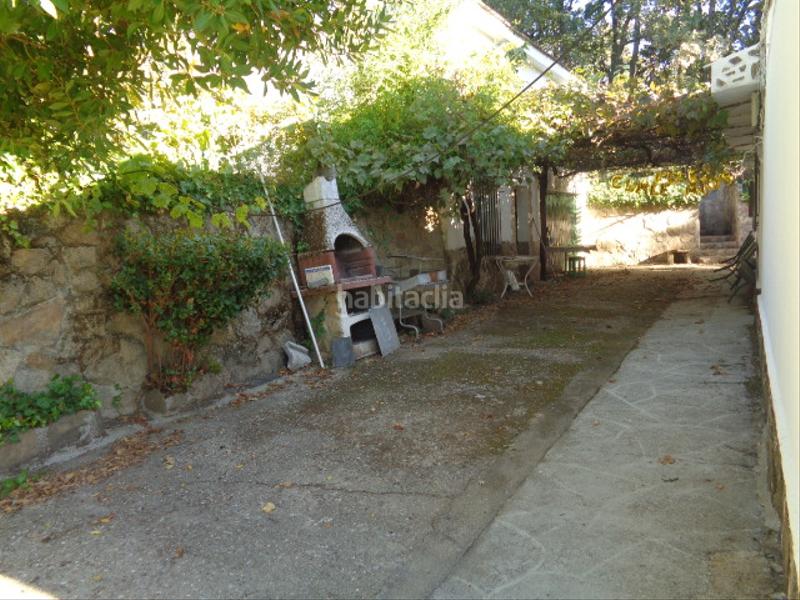 Foto 4c15c25e-f16a-485f-94b3-ef30f786b842. Chalet with fireplace parking pool in Navamorcuende