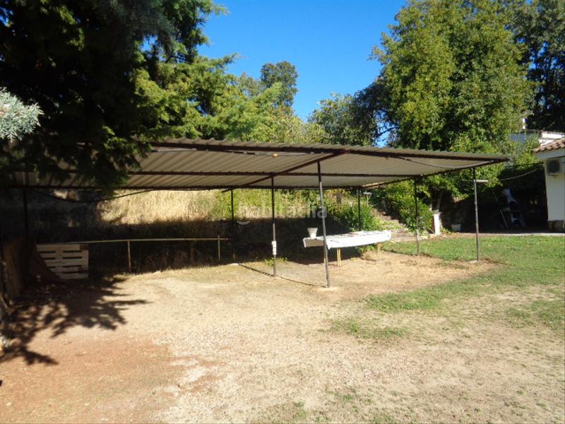 Foto b9c89b91-95a4-4740-af7a-fbff6d4ee72c. Chalet with fireplace parking pool in Navamorcuende