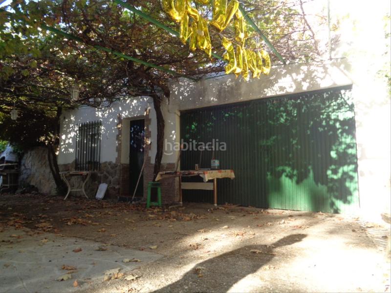 Foto d7885c12-53f9-44ba-9eb5-a8c6aba43b55. Chalet with fireplace parking pool in Navamorcuende