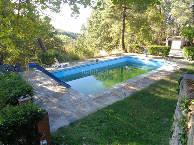 Foto dfe51b02-13c1-4bb8-927e-d4e3d85a8e1a. Chalet with fireplace parking pool in Navamorcuende