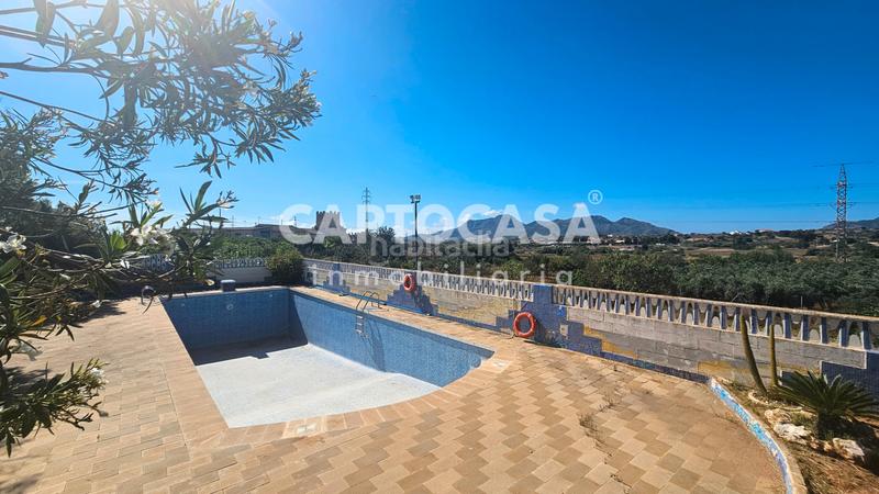 Foto 3a627a03-f546-463e-ad51-dd5dc8c82ba7. Masia amb xemeneia calefacció aparcament piscina a Cartagena