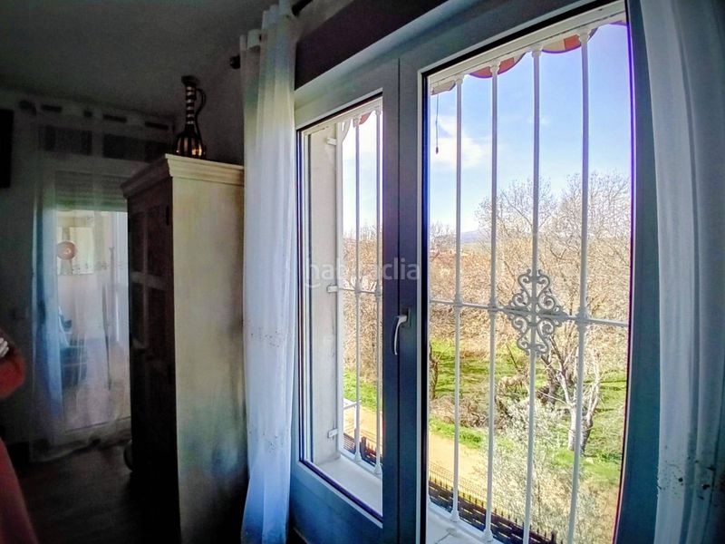 Foto b023e547-5fd4-4b8c-b973-00d1042e81c4. Casa adossada a Pedrezuela