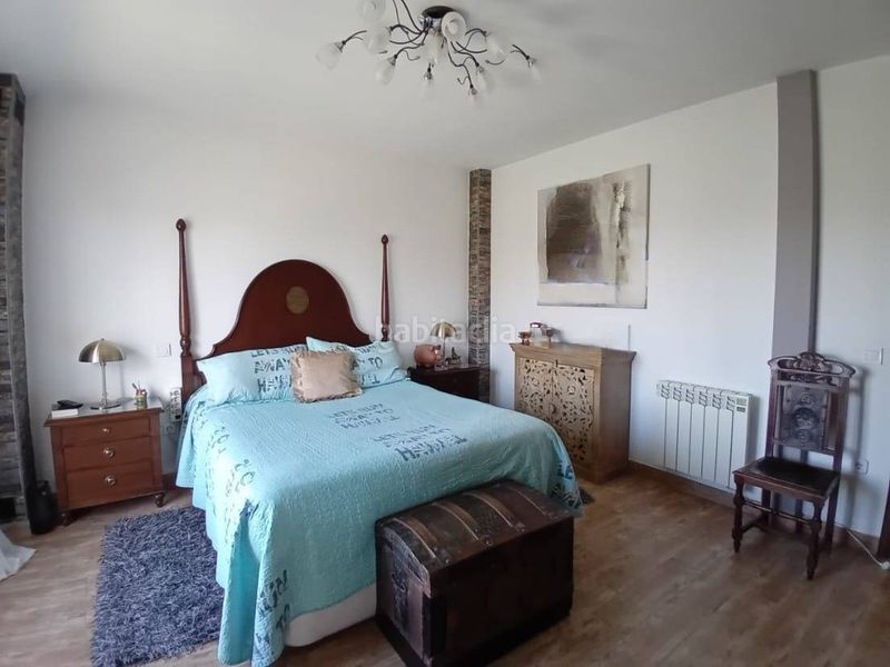 Foto cf8c6dfc-2b70-44fc-aa36-b798027d5a66. Casa adossada a Pedrezuela